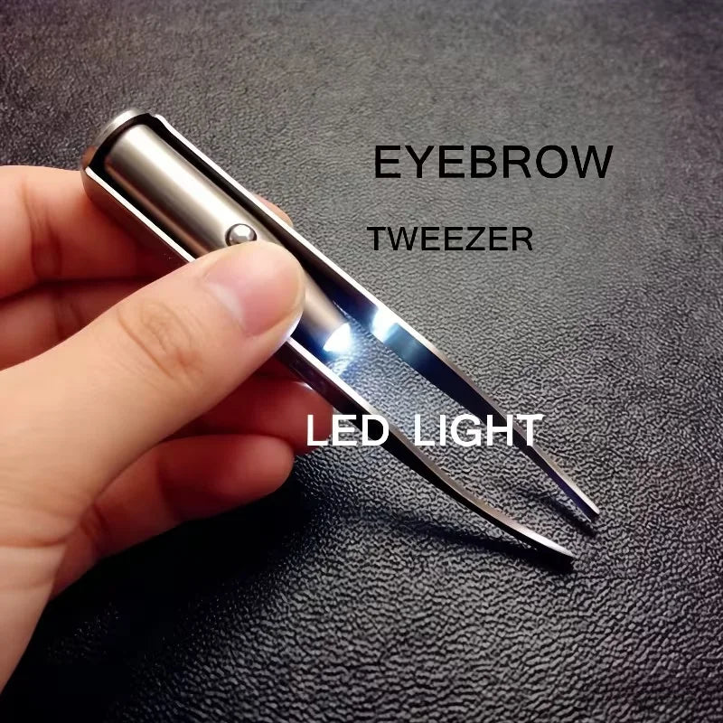LED Light Precision Eyebrow Tweezer - held in hand with LED tip lit