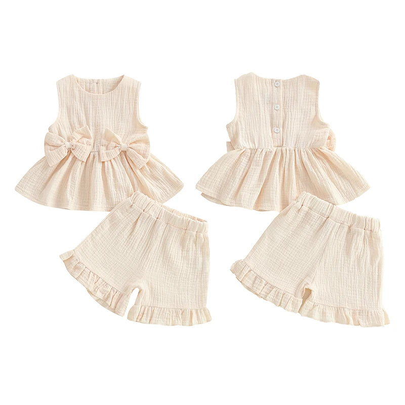 2024-12-24 Lioraitiin Toddler Baby Girl Summer Clothes Solid Color Bow Round Neck Tank Tops + Elastic Waist Ruffled Shorts Set