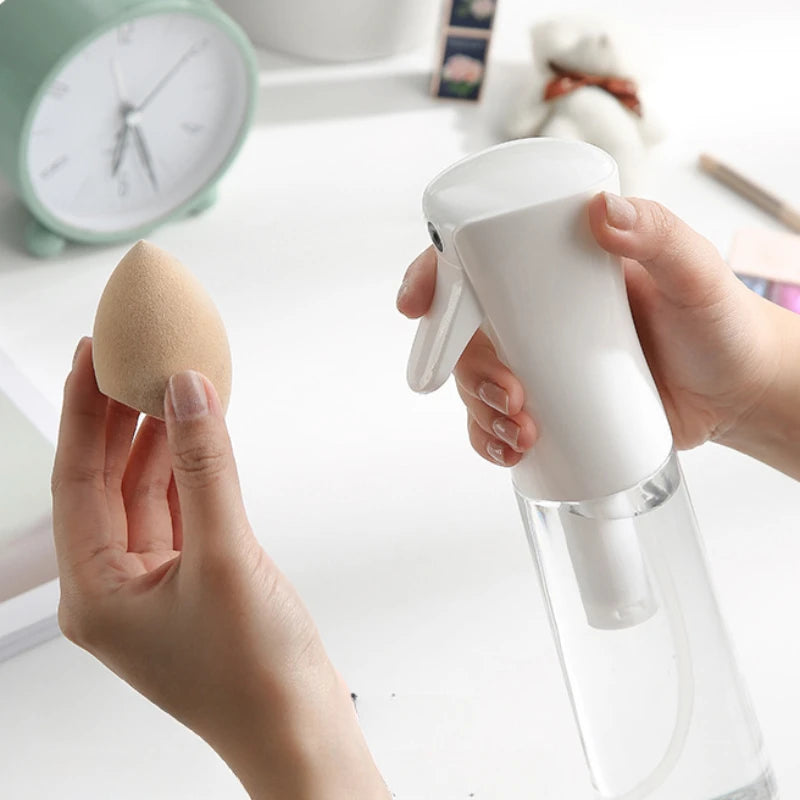 Using the Fine Mist Continuous Setting Spray Bottle with a makeup sponge