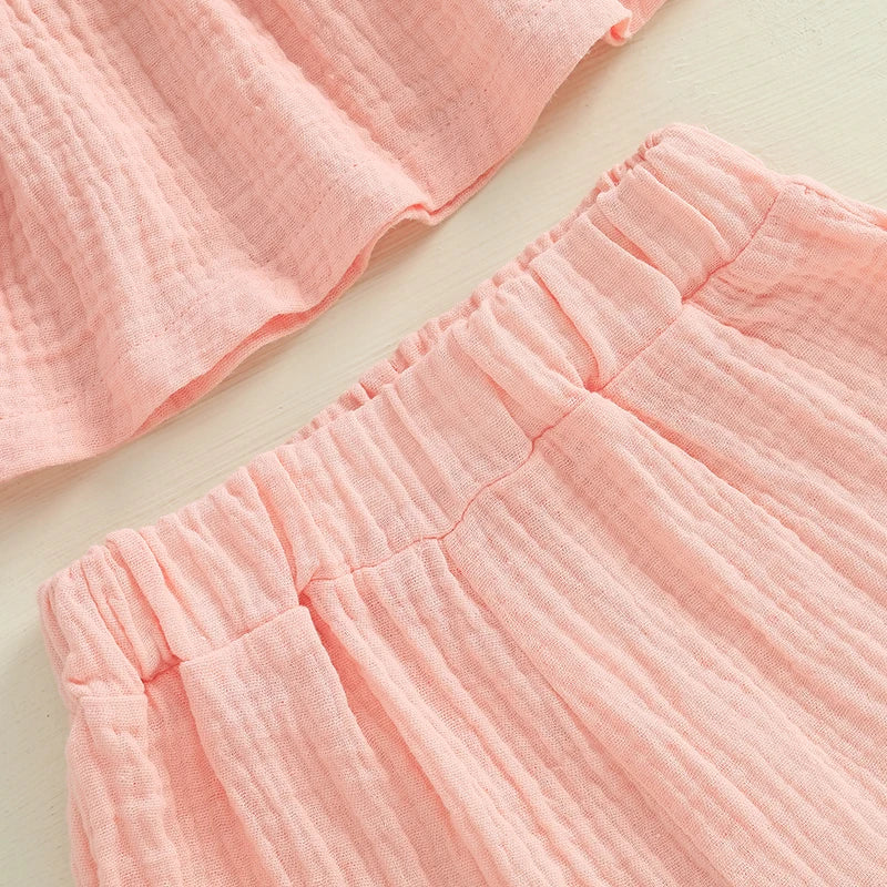 2024-12-24 Lioraitiin Toddler Baby Girl Summer Clothes Solid Color Bow Round Neck Tank Tops + Elastic Waist Ruffled Shorts Set