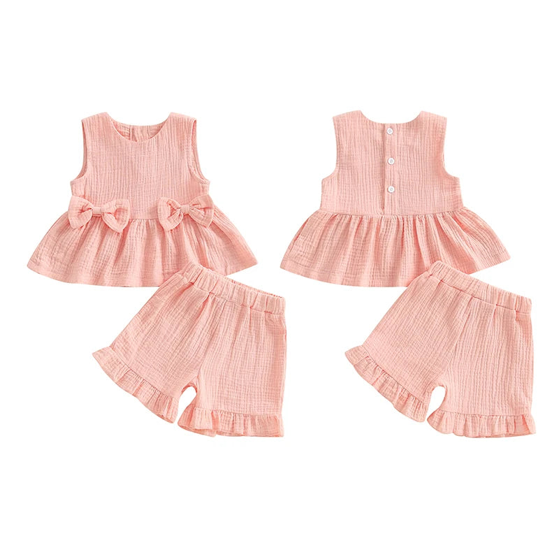 2024-12-24 Lioraitiin Toddler Baby Girl Summer Clothes Solid Color Bow Round Neck Tank Tops + Elastic Waist Ruffled Shorts Set